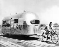 Airstreambeingpulledbyacyclist.jpg